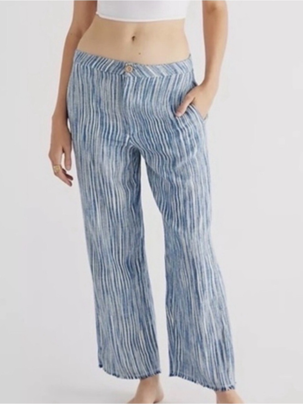 Free People Marta Yarn Dye Pants with a relaxed, wide-leg cut and raw-edge hem.